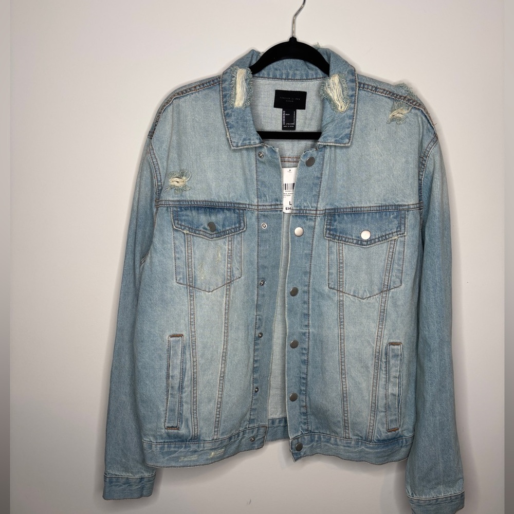 Light wash distressed denim jacket